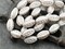 *10* 15x9mm Metallic Beige Washed White Alabaster Luster Twisted Oval Beads